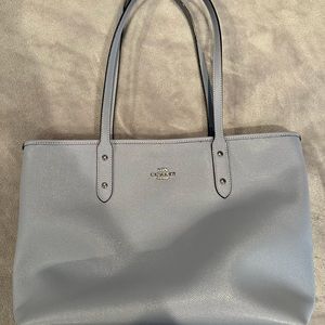 Light blue coach bag. Mild wear/use
